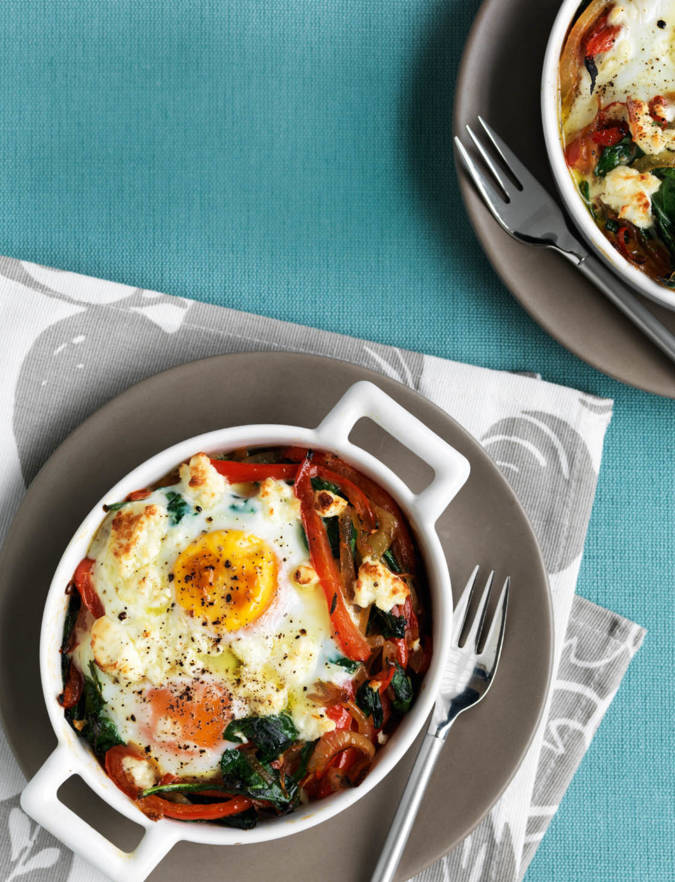 Baked eggs with spicy peppers, spinach and feta Sainsbury's Magazine